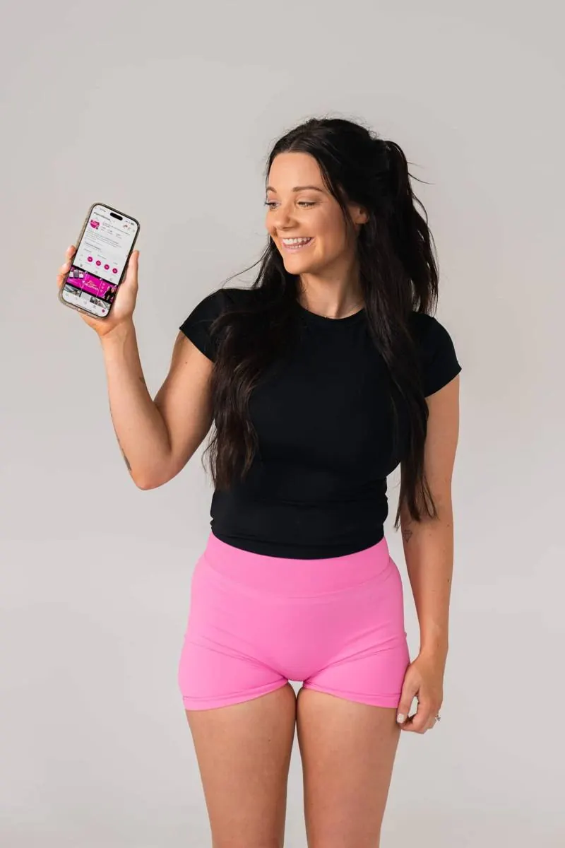 Woman training with online coaching program